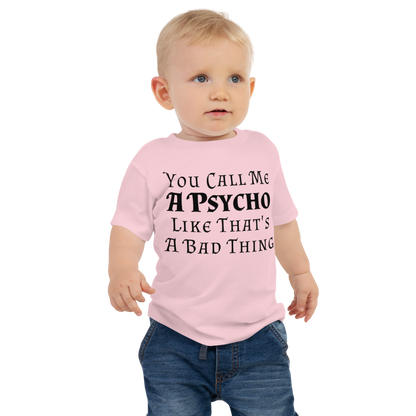 "You Call Me A Psycho Like That's A Bad Thing" printed on a pink baby jersey short sleeve tee worn by a male