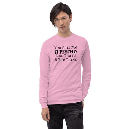 "You Call Me A Psycho Like That's A Bad Thing" printed on a light pink men's long sleeve shirt worn by a male