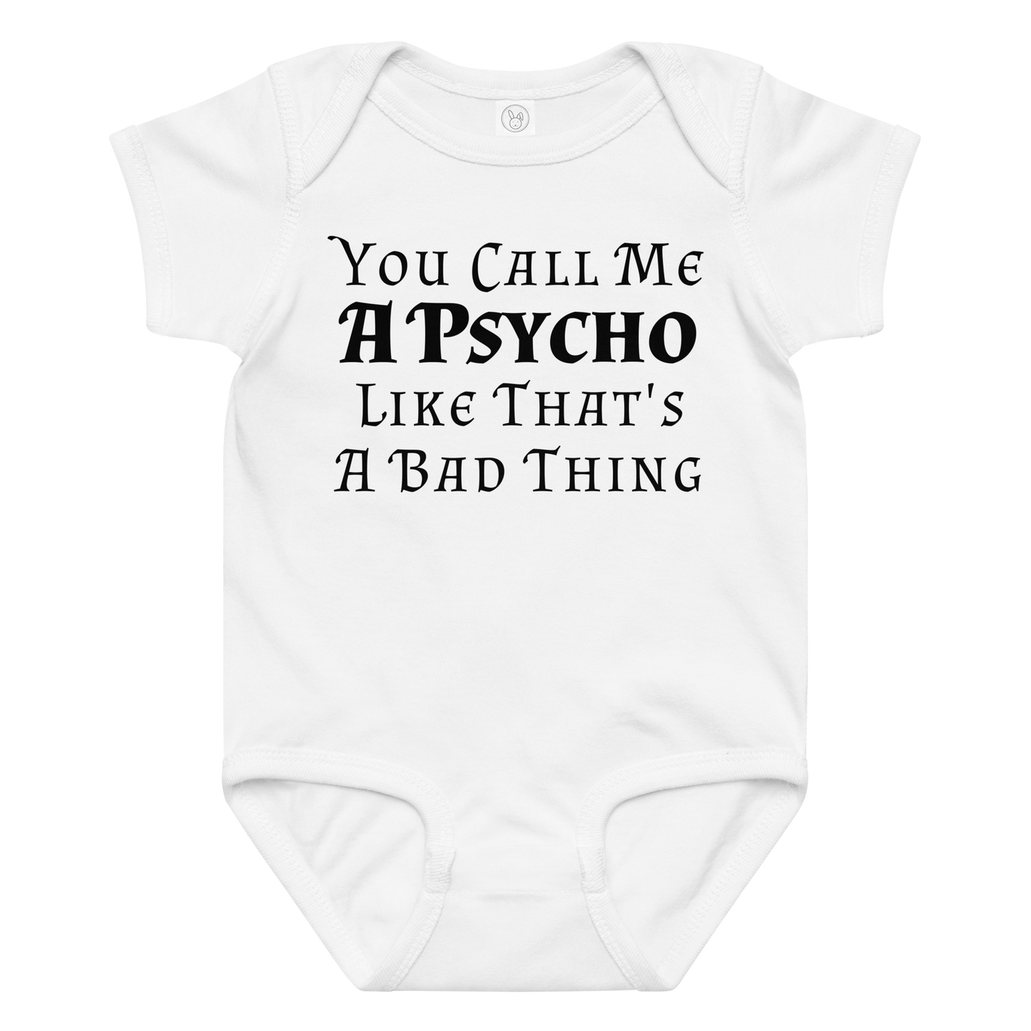 "You Call Me A Psycho Like That's A Bad Thing" printed on a white baby jersey bodysuit laying on a flat surface amongst other clothes