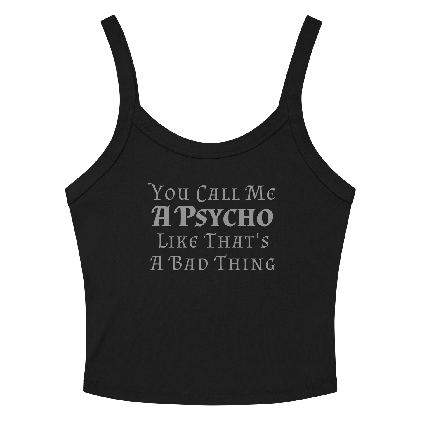"You Call Me A Psycho Like That's A Bad Thing" printed on a solid black blend women's micro-rib tanktop laying on a flat surface amongst sunglasses and shorts