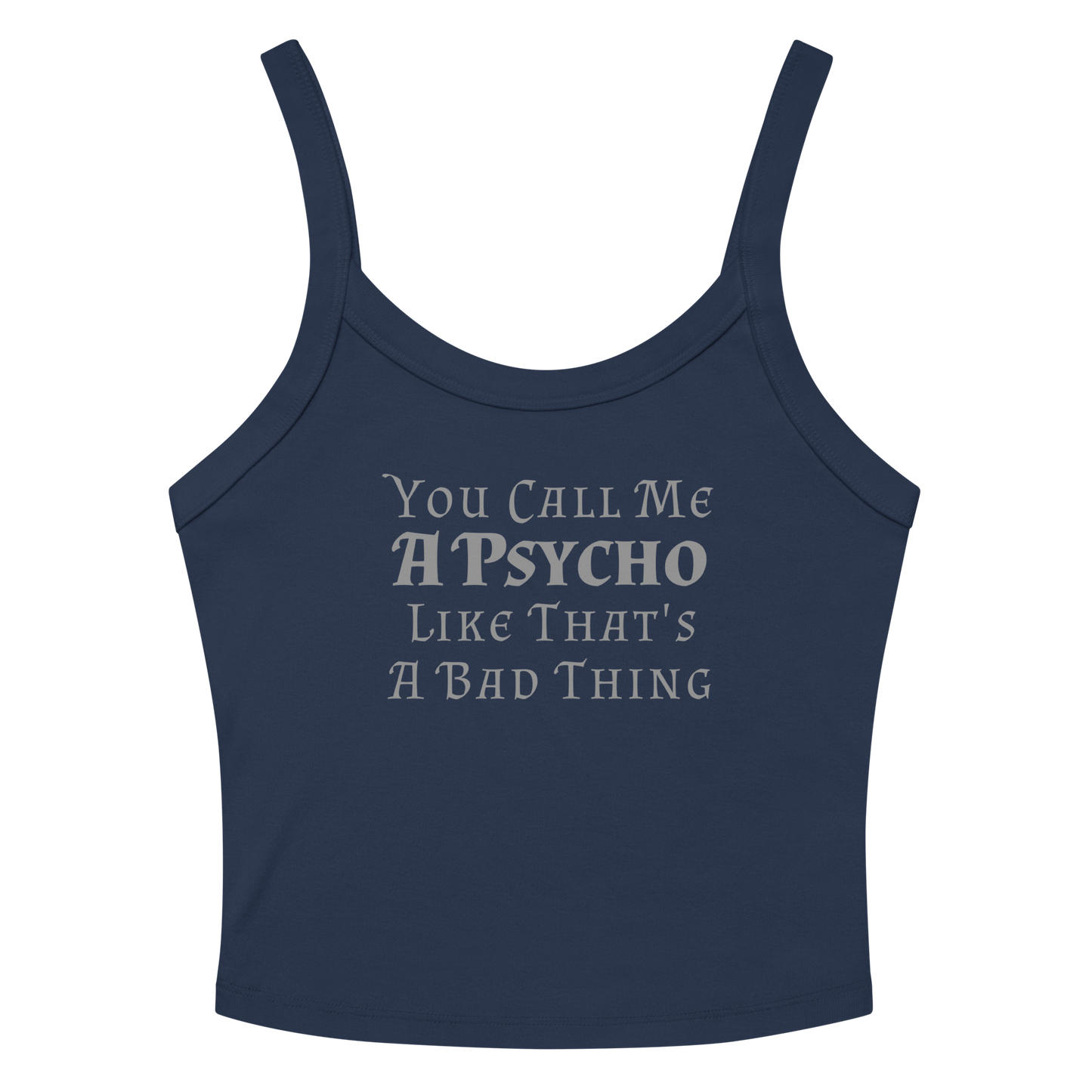 "You Call Me A Psycho Like That's A Bad Thing" printed on a solid navy blend women's micro-rib tanktop laying on a flat surface amongst sunglasses and shorts