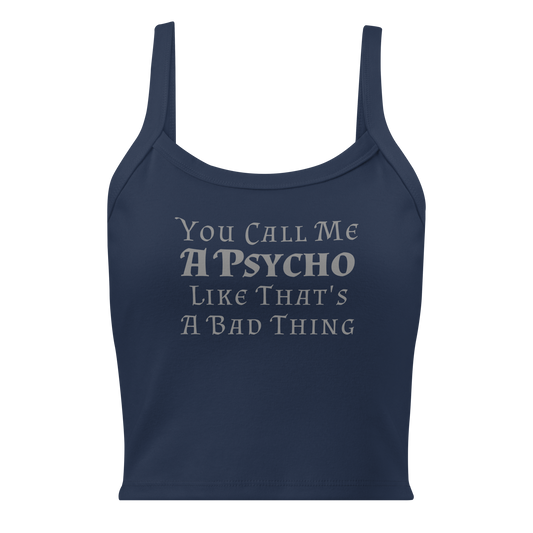 "You Call Me A Psycho Like That's A Bad Thing" printed on a solid navy blend women's micro-rib tanktop laying on a flat surface