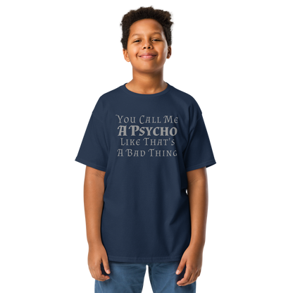 "You Call Me A Psycho Like That's A Bad Thing" printed on a navy youth classic tee worn by a male