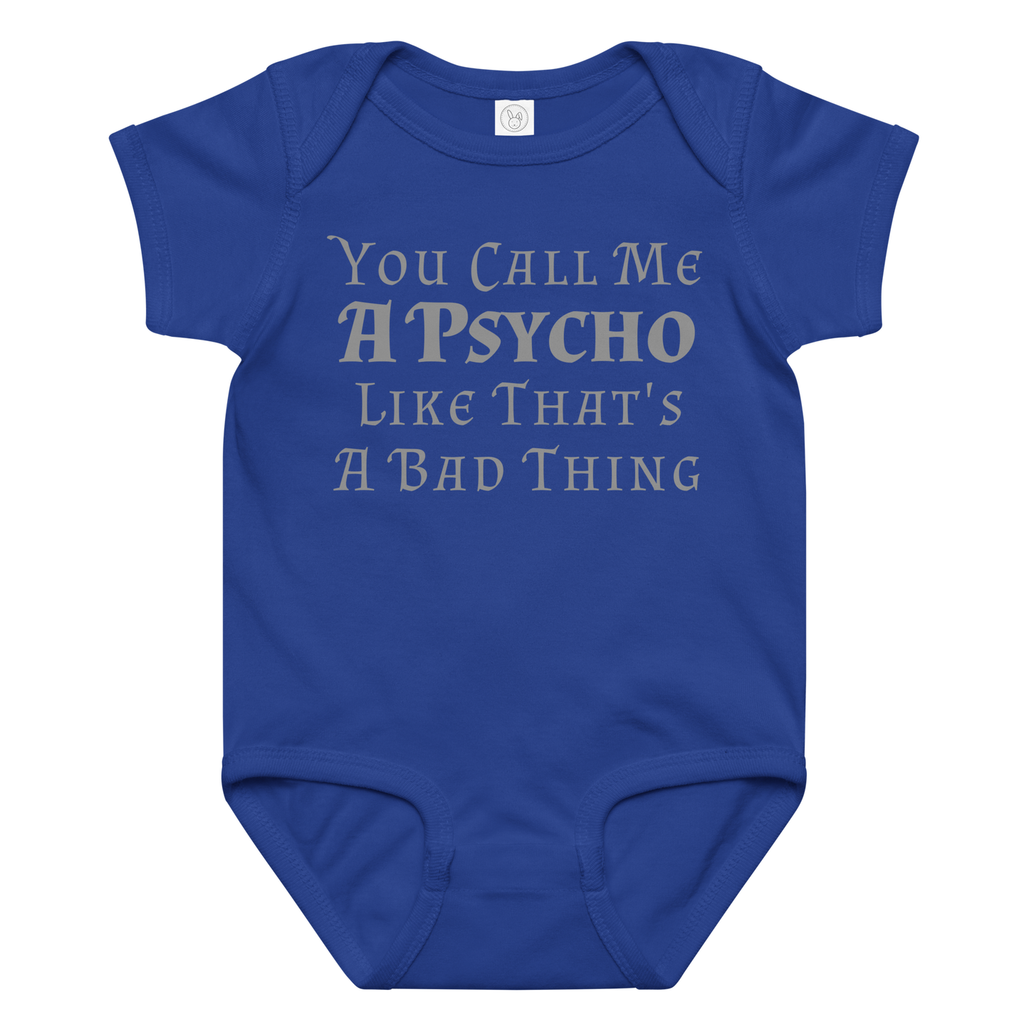 "You Call Me A Psycho Like That's A Bad Thing" printed on a royal baby jersey bodysuit laying on a flat surface amongst other clothes