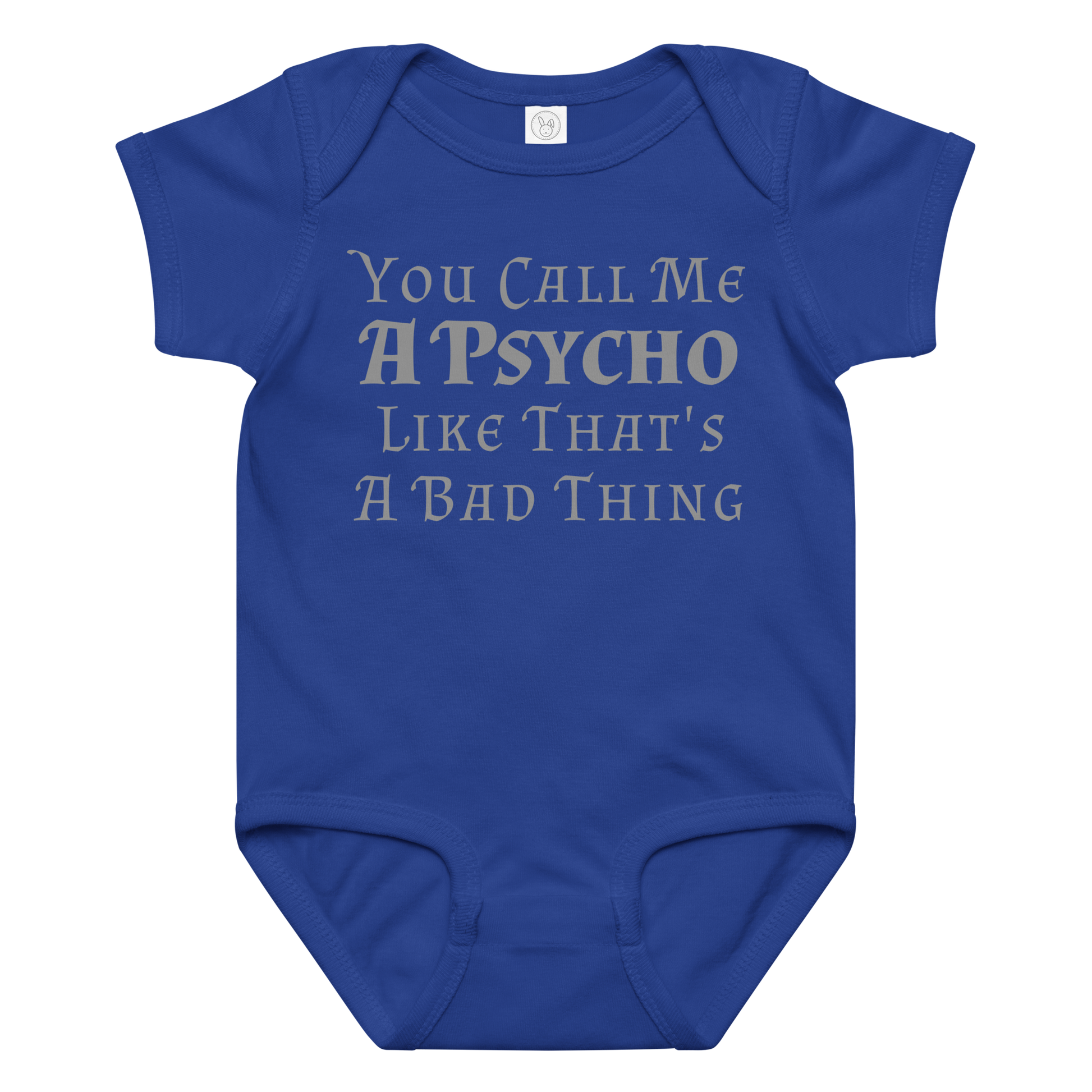 "You Call Me A Psycho Like That's A Bad Thing" printed on a royal baby jersey bodysuit laying on a flat surface amongst other clothes