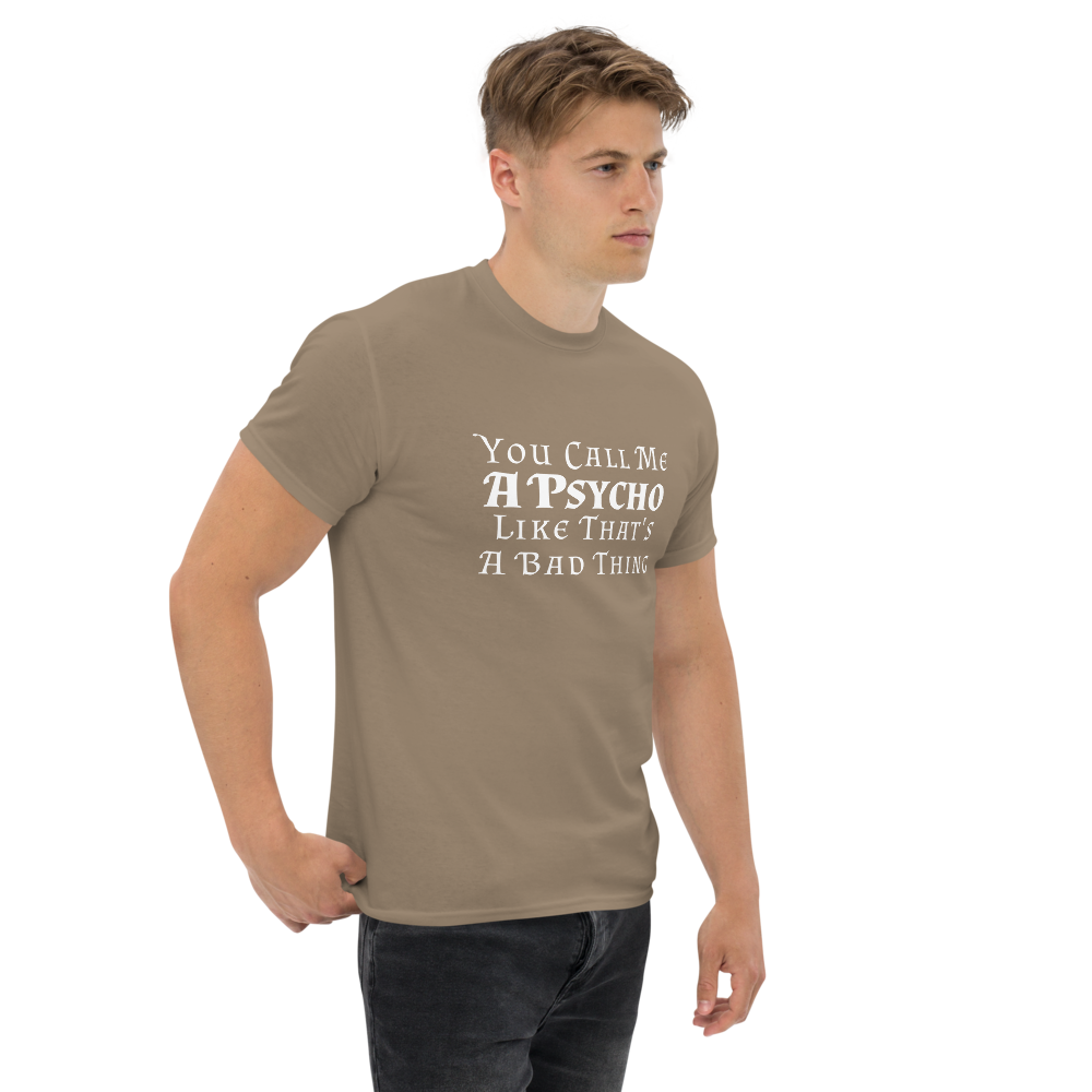 "You Call Me A Psycho Like That's A Bad Thing" printed on a brown savana unisex classic tee worn by a male