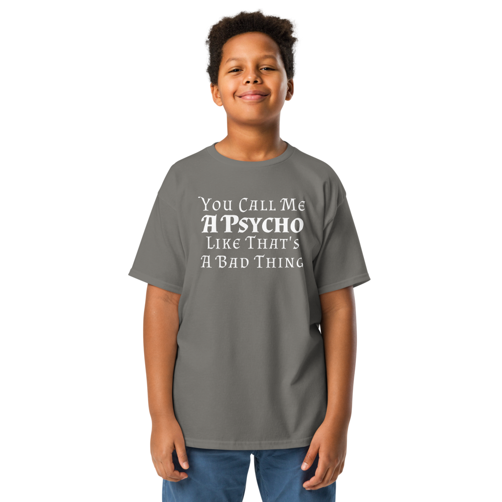 "You Call Me A Psycho Like That's A Bad Thing" printed on a charcoal youth classic tee worn by a male