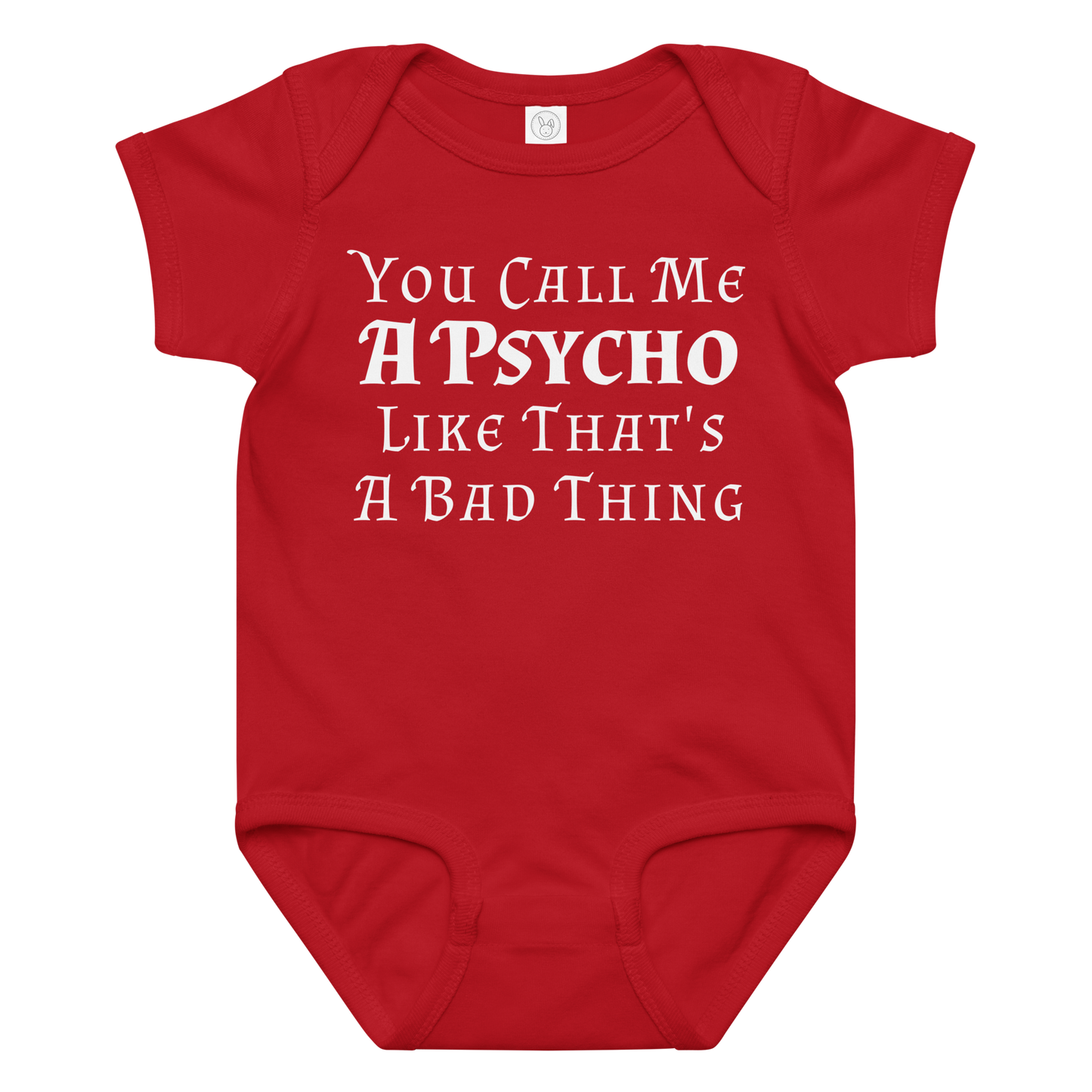 "You Call Me A Psycho Like That's A Bad Thing" printed on a red baby jersey bodysuit laying on a flat surface amongst other clothes