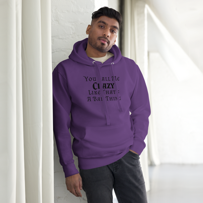 "You Call Me Crazy Like That's A Bad Thing" printed on a purple unisex hoodie worn by a male