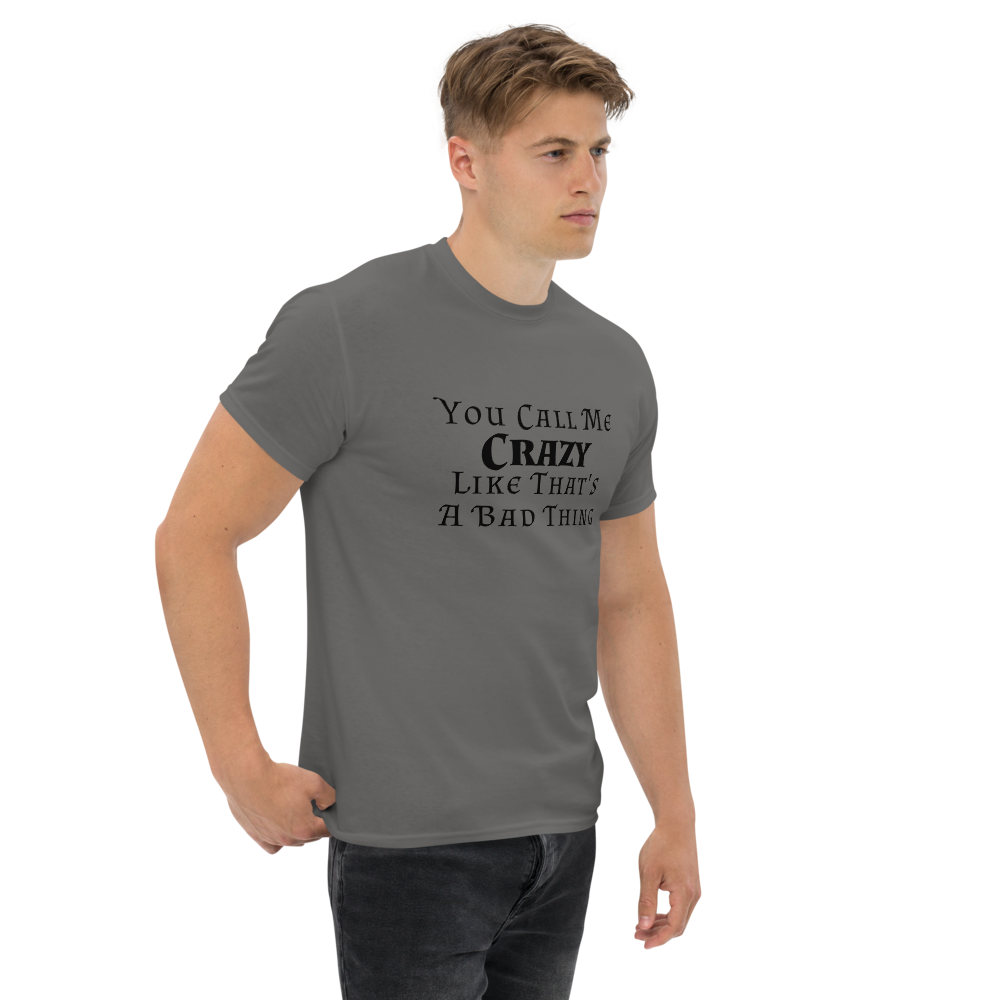 "You Call Me Crazy Like That's A Bad Thing" printed on a charcoal unisex classic tee worn by a male