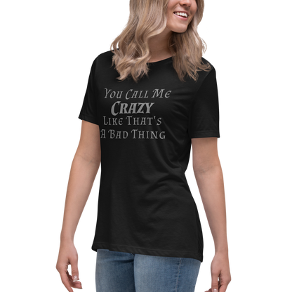 "You Call Me Crazy Like That's A Bad Thing" printed on a black women's relaxed t-shirt worn by a female