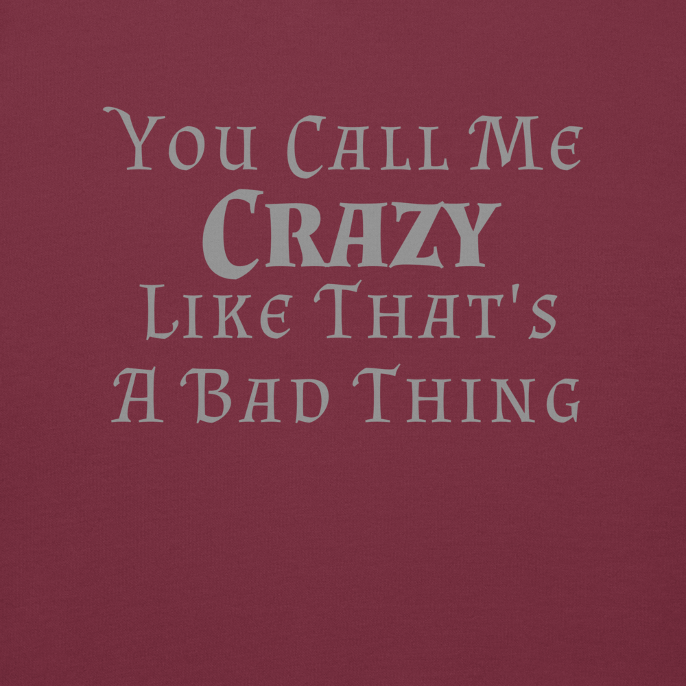 "You Call Me Crazy Like That's A Bad Thing" printed on a maroon background