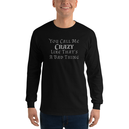 "You Call Me Crazy Like That's A Bad Thing" printed on a black men's long sleeve shirt worn by a male