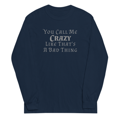 "You Call Me Crazy Like That's A Bad Thing" printed on a navy men's long sleeve shirt laying on a flat surface