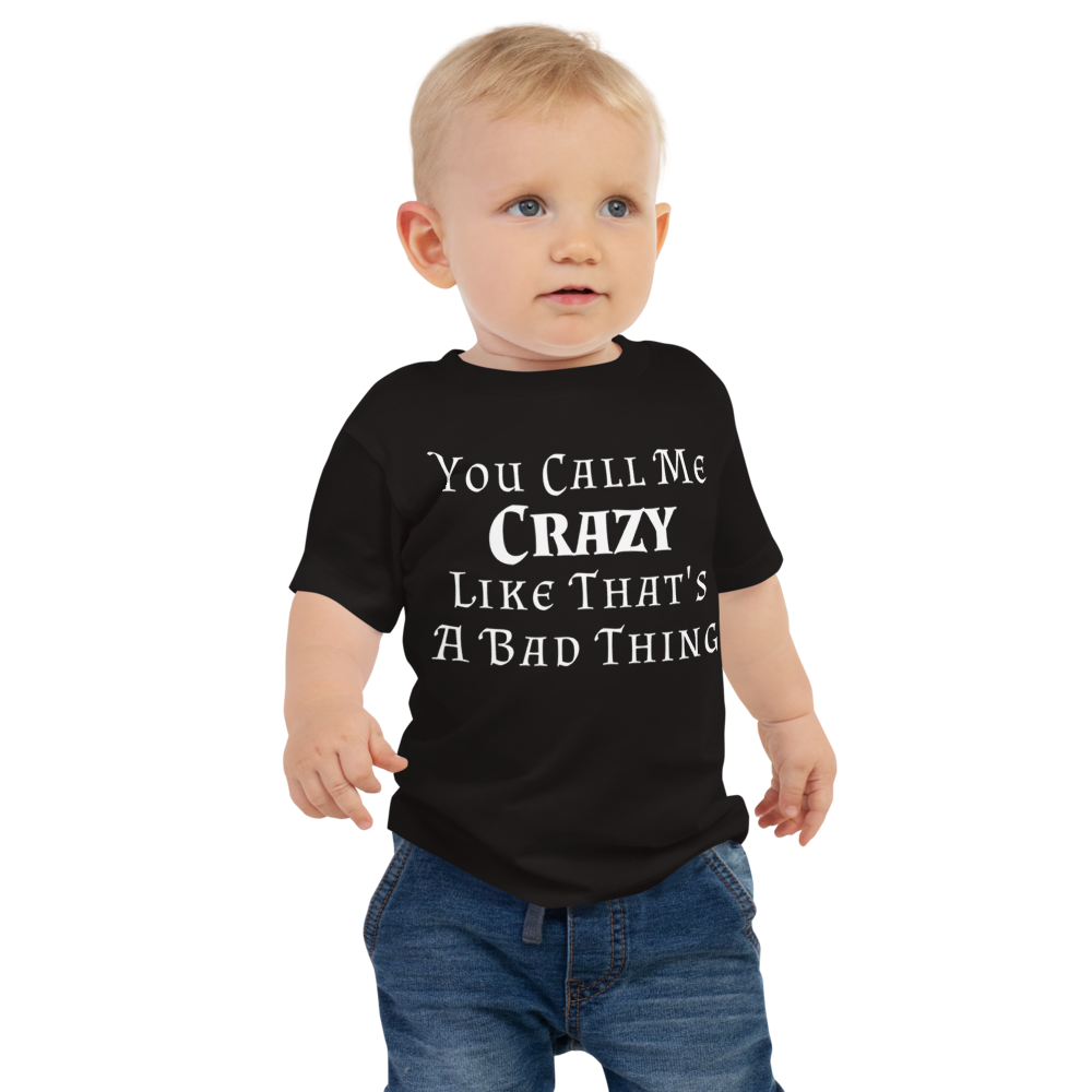 "You Call Me Crazy Like That's A Bad Thing" printed on a black baby jersey short sleeve tee worn by a male