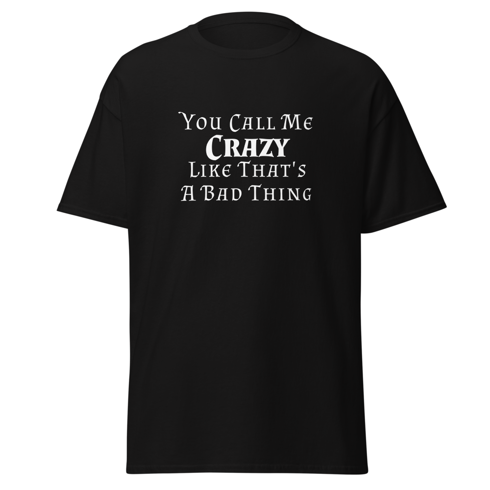"You Call Me Crazy Like That's A Bad Thing" printed on a black unisex classic tee laying on a flat surface