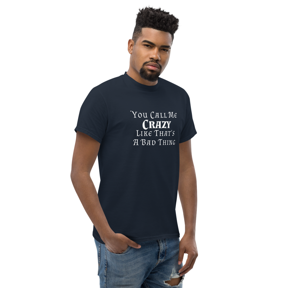 "You Call Me Crazy Like That's A Bad Thing" printed on a navy unisex classic tee worn by a male