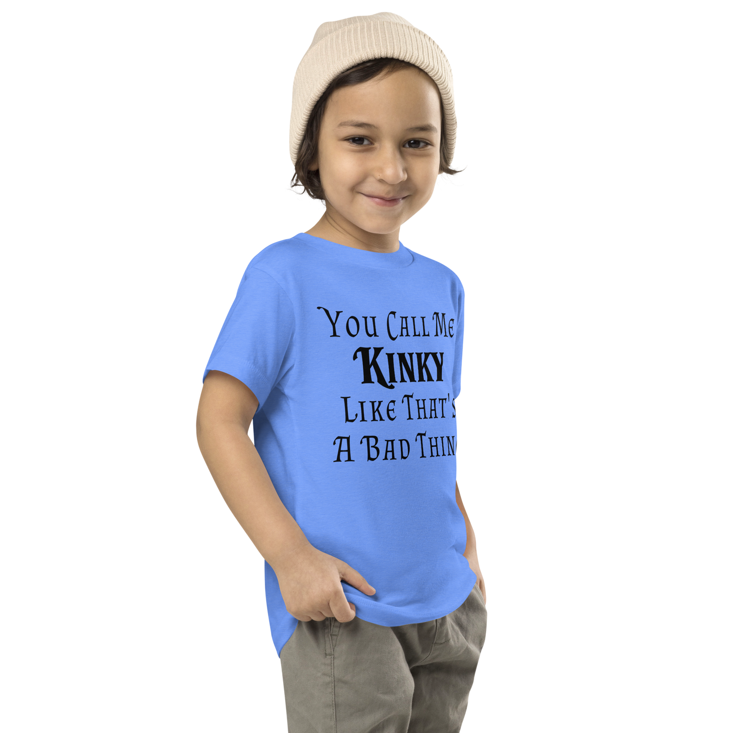 "You Call Me Kinky Like That's A Bad Thing" printed on a heather columbia blue toddler short sleeve tee worn by a male who is also wearing a knit cap