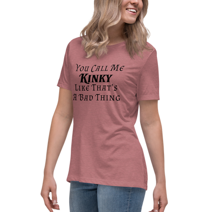 "You Call Me Kinky Like That's A Bad Thing" printed on a heather mauve women's relaxed t-shirt worn by a female