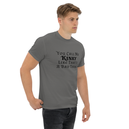 "You Call Me Kinky Like That's A Bad Thing" printed on a charcoal unisex classic tee worn by a male
