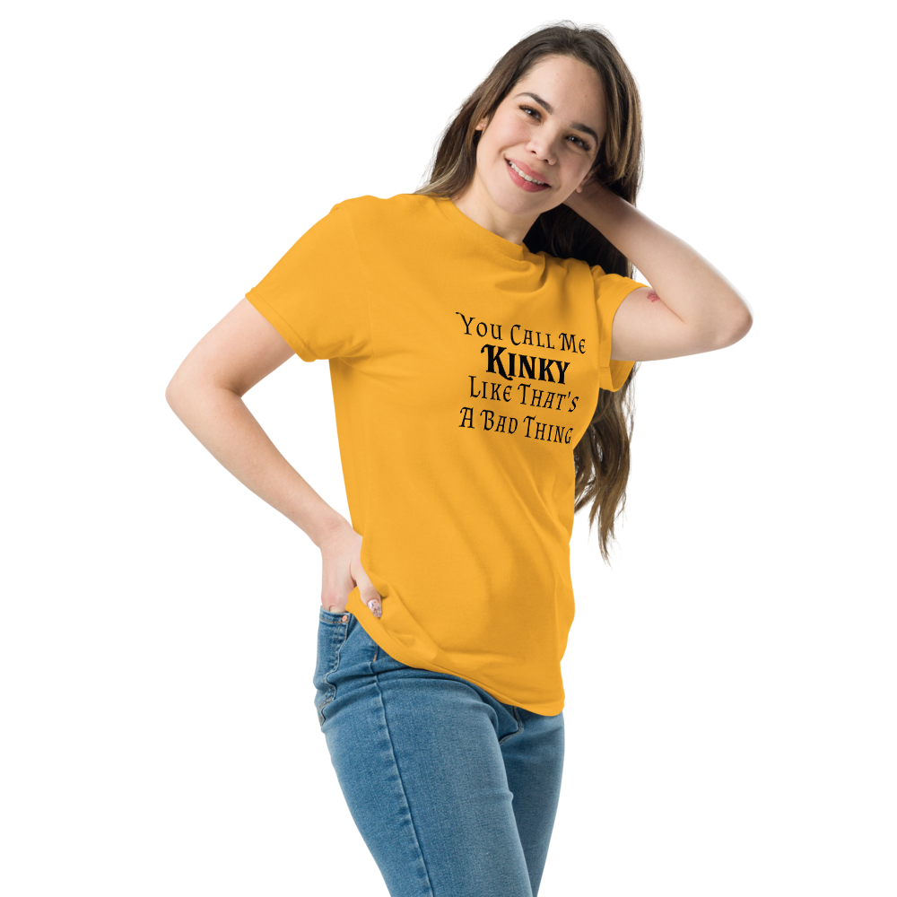 "You Call Me Kinky Like That's A Bad Thing" printed on a gold unisex classic tee worn by a female