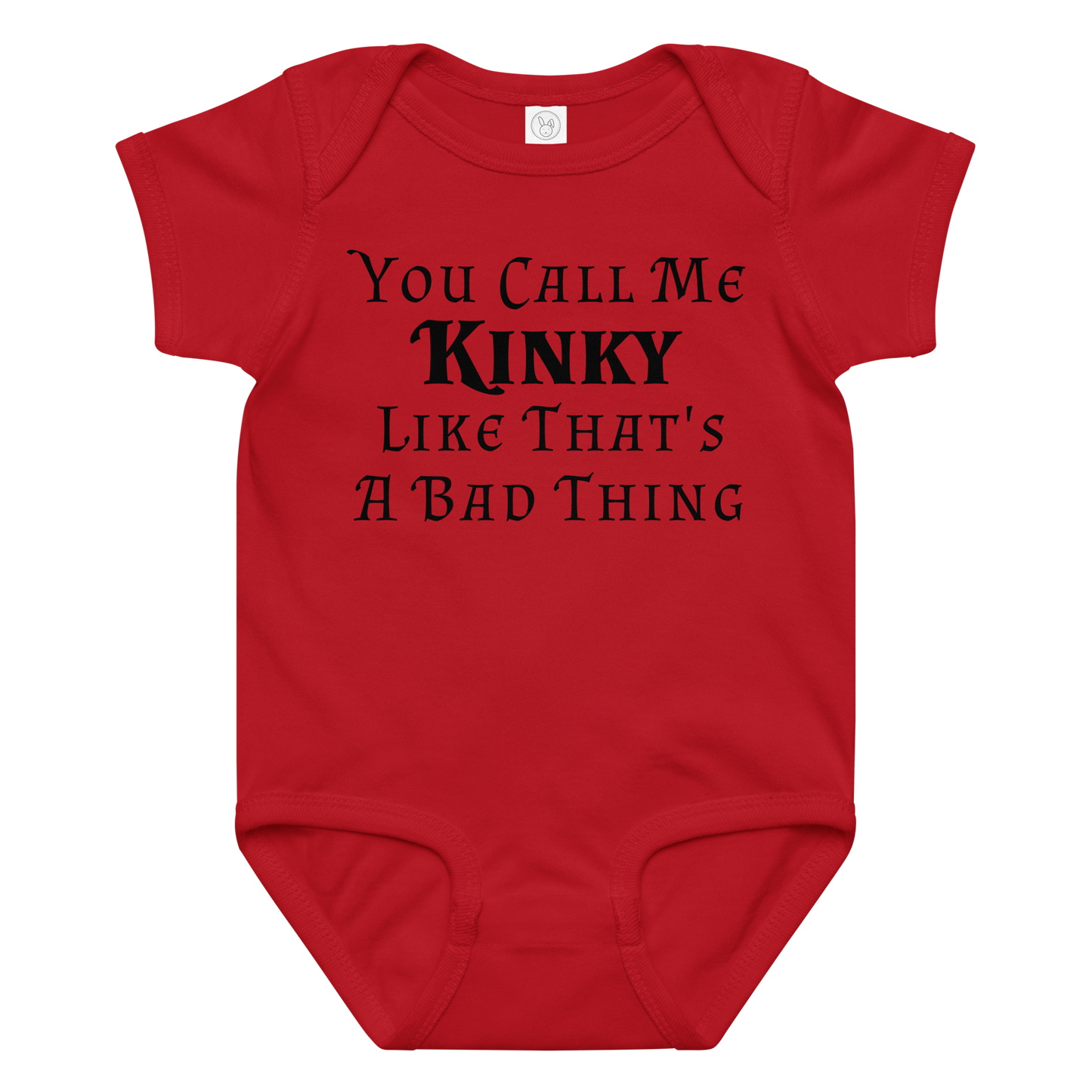 "You Call Me Kinky Like That's A Bad Thing" printed on a red baby jersey bodysuit laying on a flat surface amongst other clothes