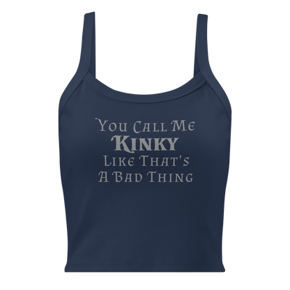 "You Call Me Kinky Like That's A Bad Thing" printed on a solid navy blend women's micro-rib tanktop laying on a flat surface
