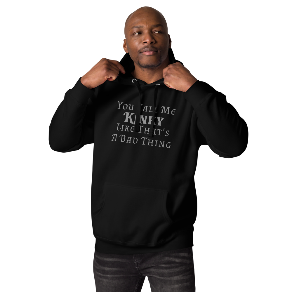"You Call Me Kinky Like That's A Bad Thing" printed on a black unisex hoodie worn by a male