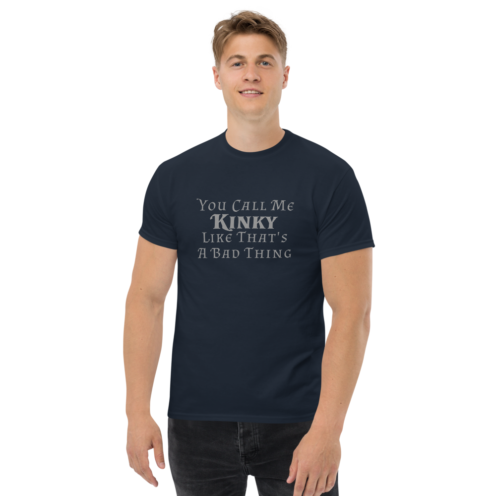 "You Call Me Kinky Like That's A Bad Thing" printed on a navy unisex classic tee worn by a male