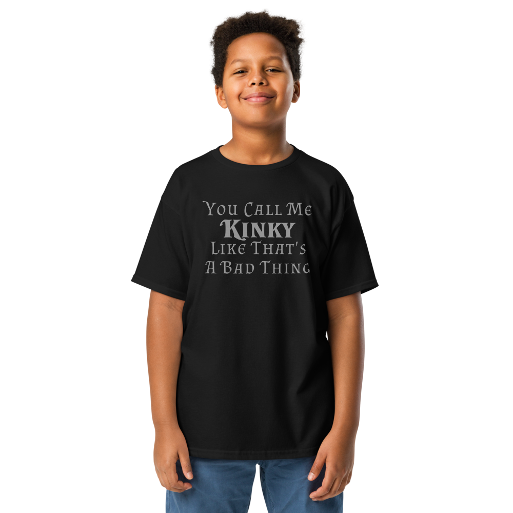 "You Call Me Kinky Like That's A Bad Thing" printed on a black youth classic tee worn by a male