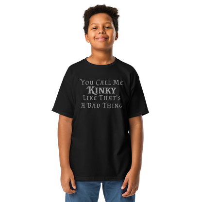 "You Call Me Kinky Like That's A Bad Thing" printed on a black youth classic tee worn by a male
