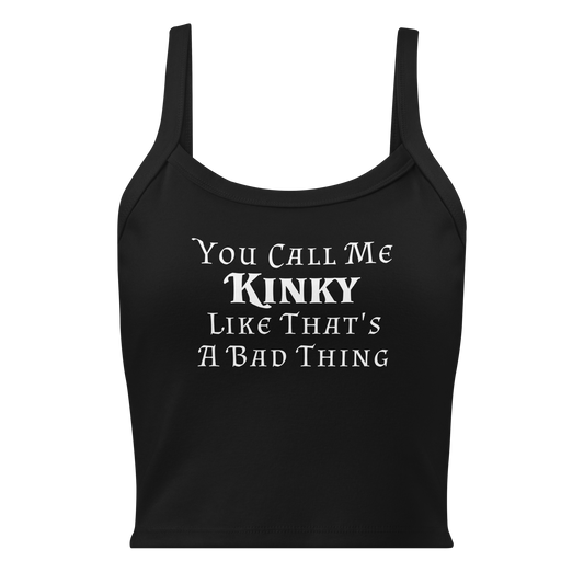 "You Call Me Kinky Like That's A Bad Thing" printed on a solid black blend women's micro-rib tanktop laying on a flat surface