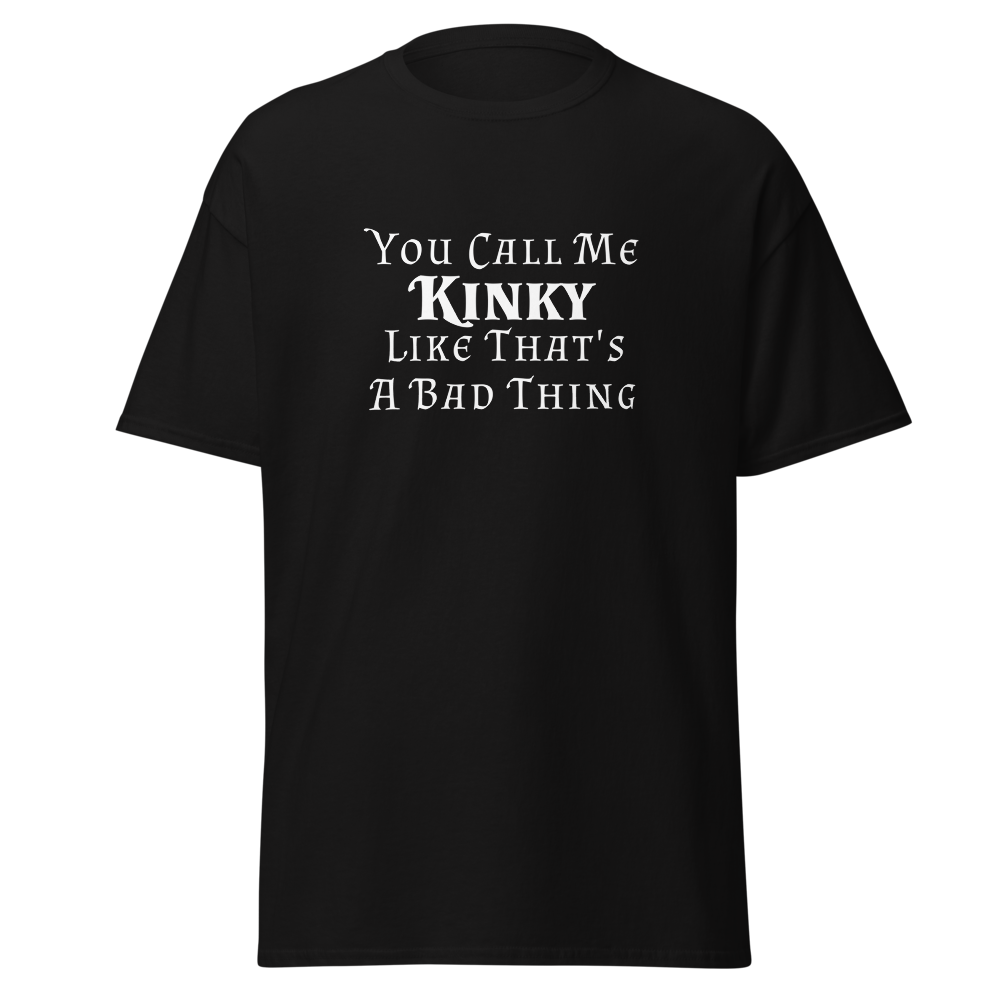 "You Call Me Kinky Like That's A Bad Thing" printed on a black unisex classic tee laying on a flat surface