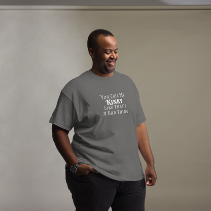 "You Call Me Kinky Like That's A Bad Thing" printed on a charcoal unisex classic tee worn by a male
