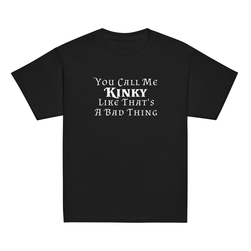 "You Call Me Kinky Like That's A Bad Thing" printed on a black youth classic tee laying on a flat surface