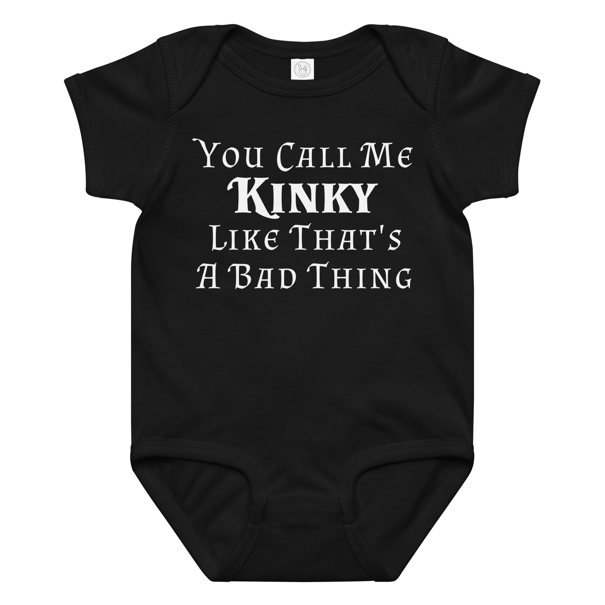 "You Call Me Kinky Like That's A Bad Thing" printed on a black baby jersey bodysuit laying on a flat surface amongst other clothes