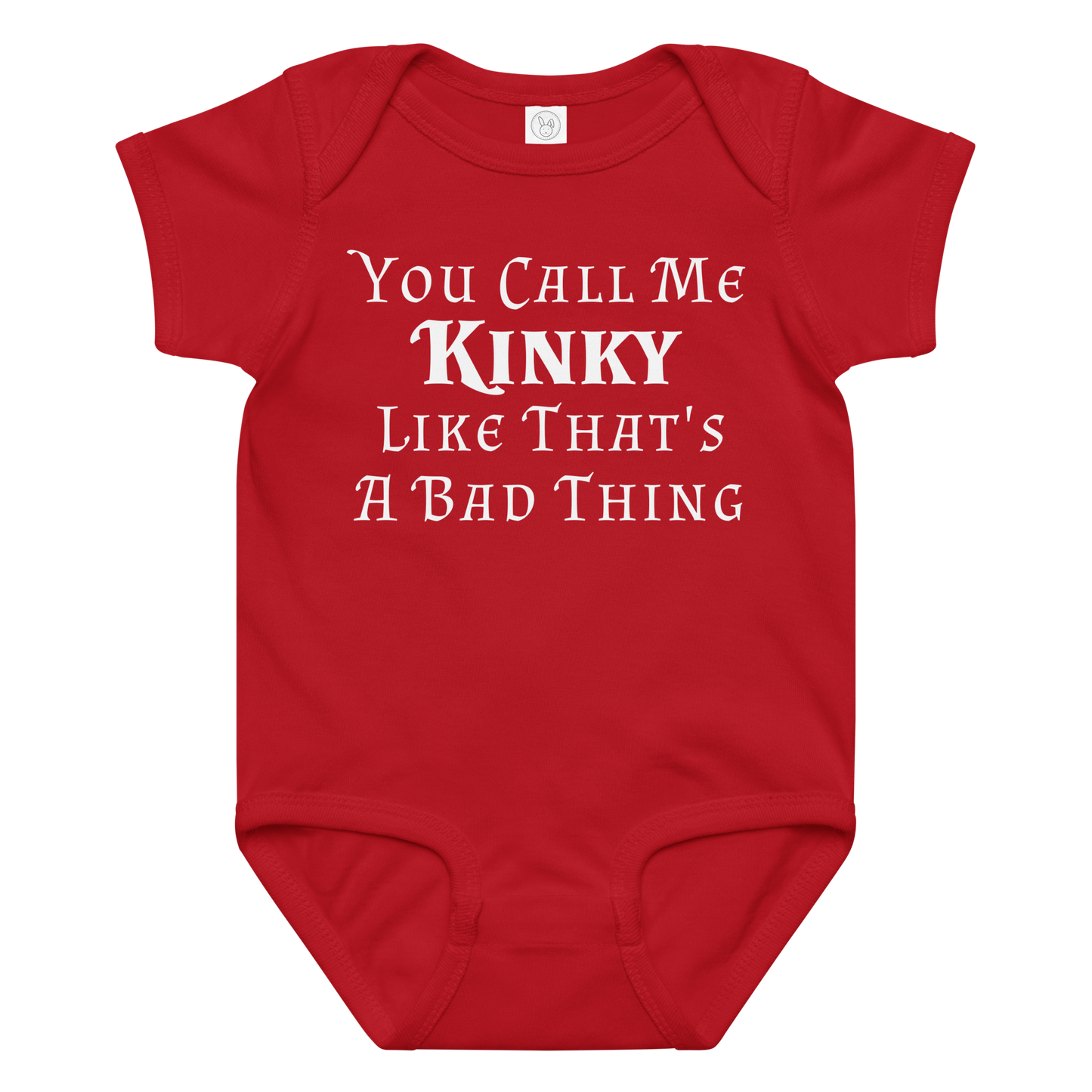 "You Call Me Kinky Like That's A Bad Thing" printed on a red baby jersey bodysuit laying on a flat surface amongst other clothes