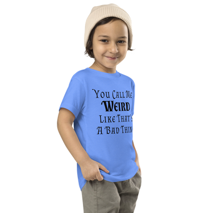 "You Call Me Weird Like That's A Bad Thing" printed on a heather columbia blue toddler short sleeve tee worn by a male who is also wearing a knit cap