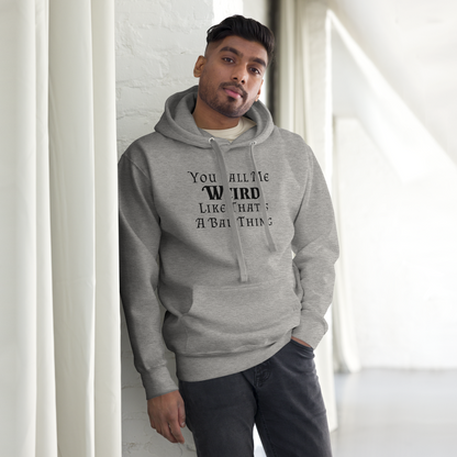 "You Call Me Weird Like That's A Bad Thing" printed on a carbon grey unisex hoodie worn by a male