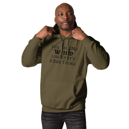 "You Call Me Weird Like That's A Bad Thing" printed on a military green unisex hoodie worn by a male