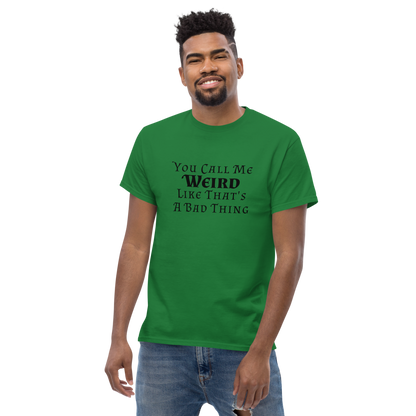"You Call Me Weird Like That's A Bad Thing" printed on a turf green unisex classic tee worn by a male