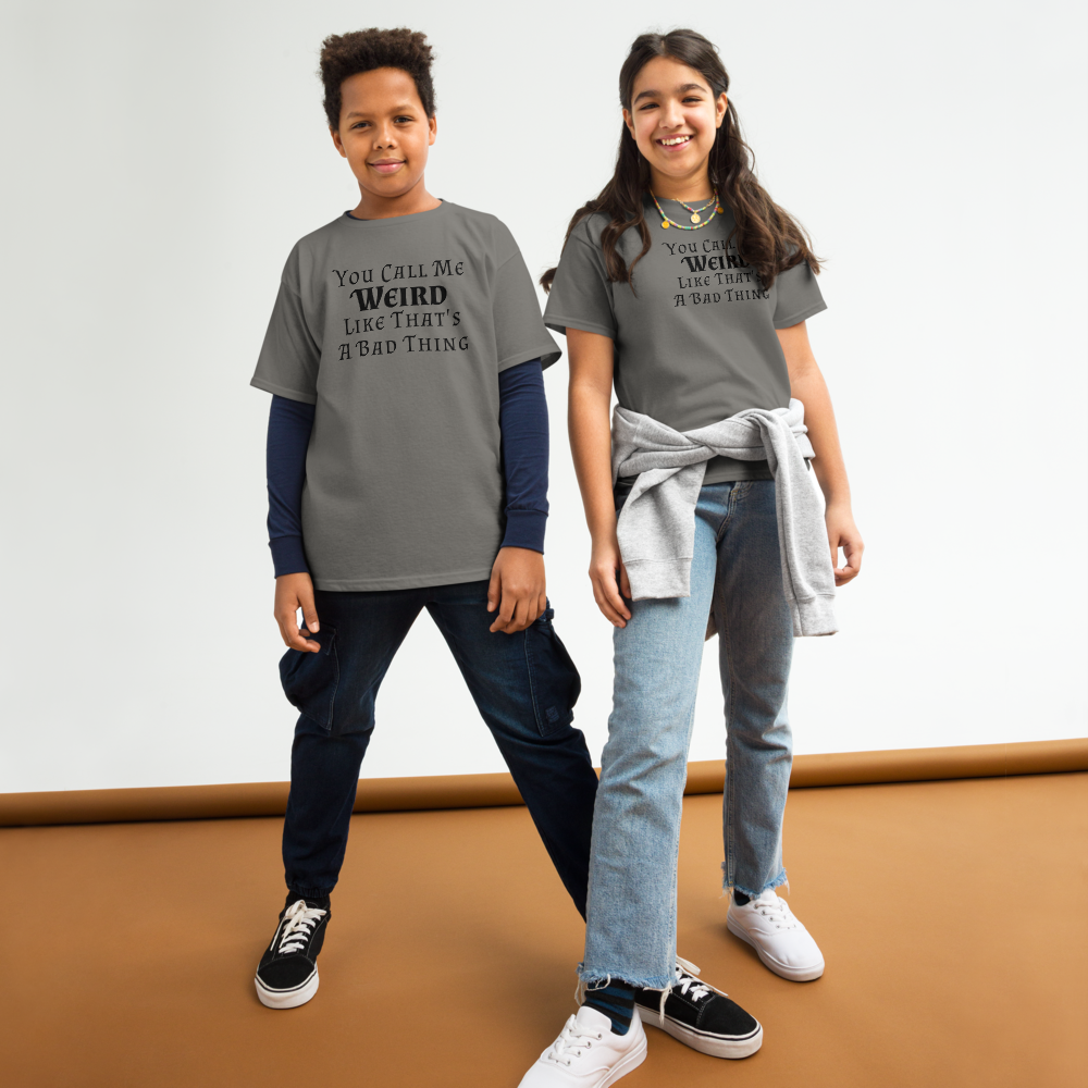 "You Call Me Weird Like That's A Bad Thing" printed on a charcoal youth classic tee worn by a female and male