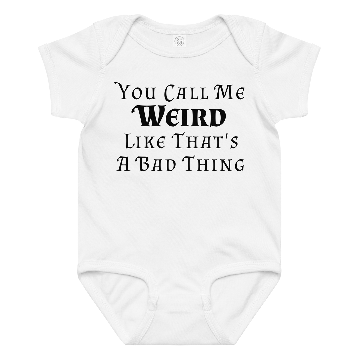 "You Call Me Weird Like That's A Bad Thing" printed on a white baby jersey bodysuit laying on a flat surface amongst other clothes