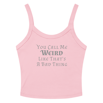 "You Call Me Weird Like That's A Bad Thing" printed on a solid pink blend women's micro-rib tanktop laying on a flat surface amongst sunglasses and shorts