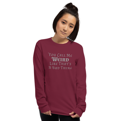 "You Call Me Weird Like That's A Bad Thing" printed on a maroon men's long sleeve shirt worn by a female