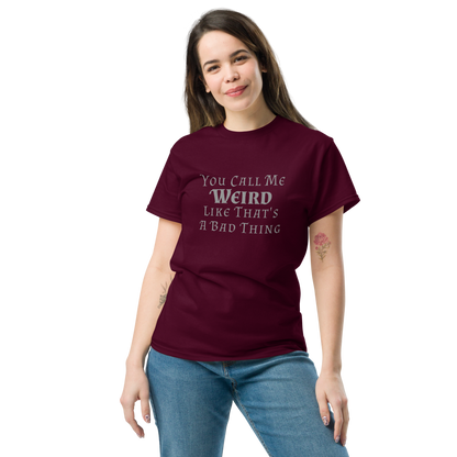 "You Call Me Weird Like That's A Bad Thing" printed on a maroon unisex classic tee worn by a female