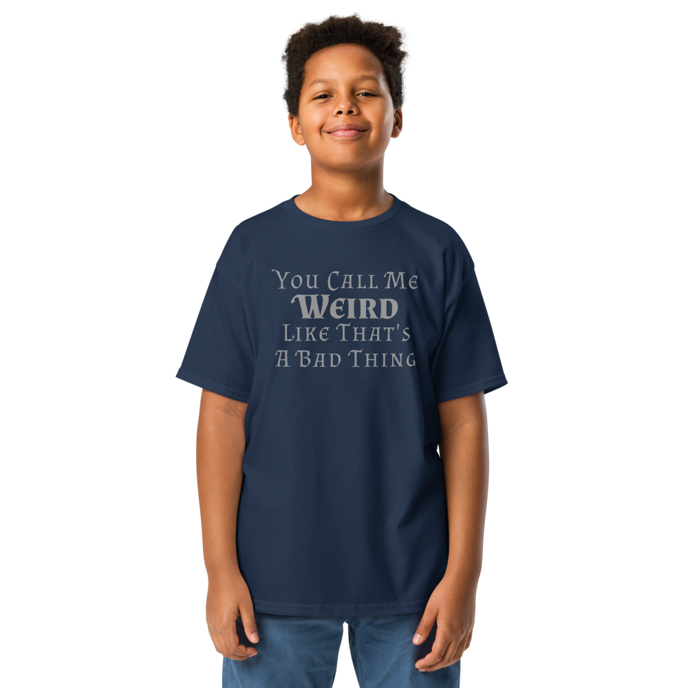 "You Call Me Weird Like That's A Bad Thing" printed on a navy youth classic tee worn by a male
