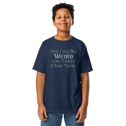 "You Call Me Weird Like That's A Bad Thing" printed on a navy youth classic tee worn by a male
