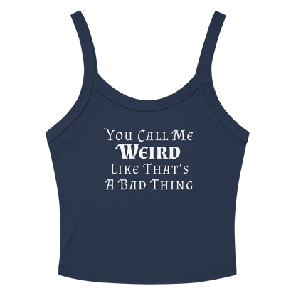 "You Call Me Weird Like That's A Bad Thing" printed on a solid navy blend women's micro-rib tanktop laying on a flat surface amongst sunglasses and shorts