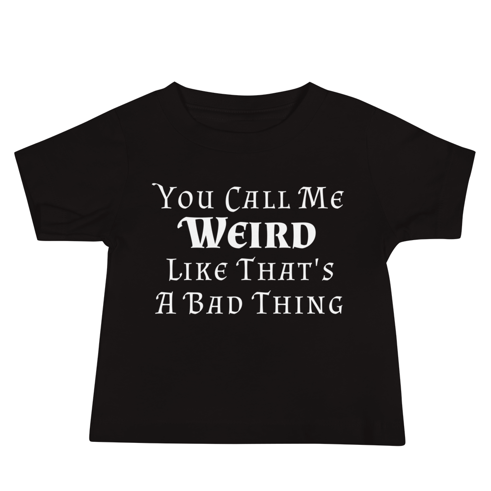 "You Call Me Weird Like That's A Bad Thing" printed on a black baby jersey short sleeve tee laying on a flat surface